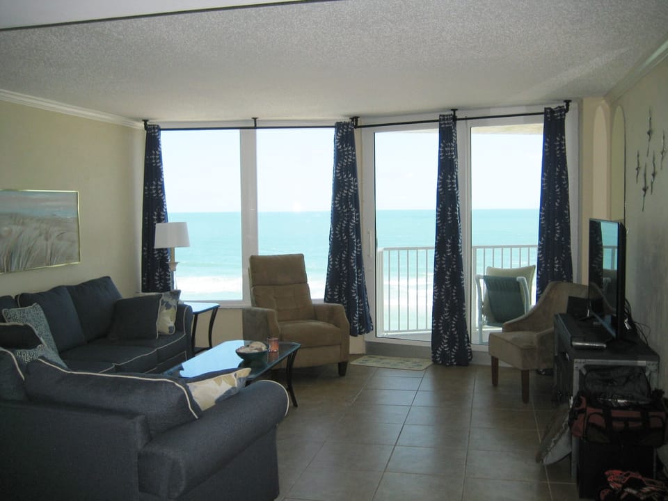 Floor to Ceiling windows across the living room