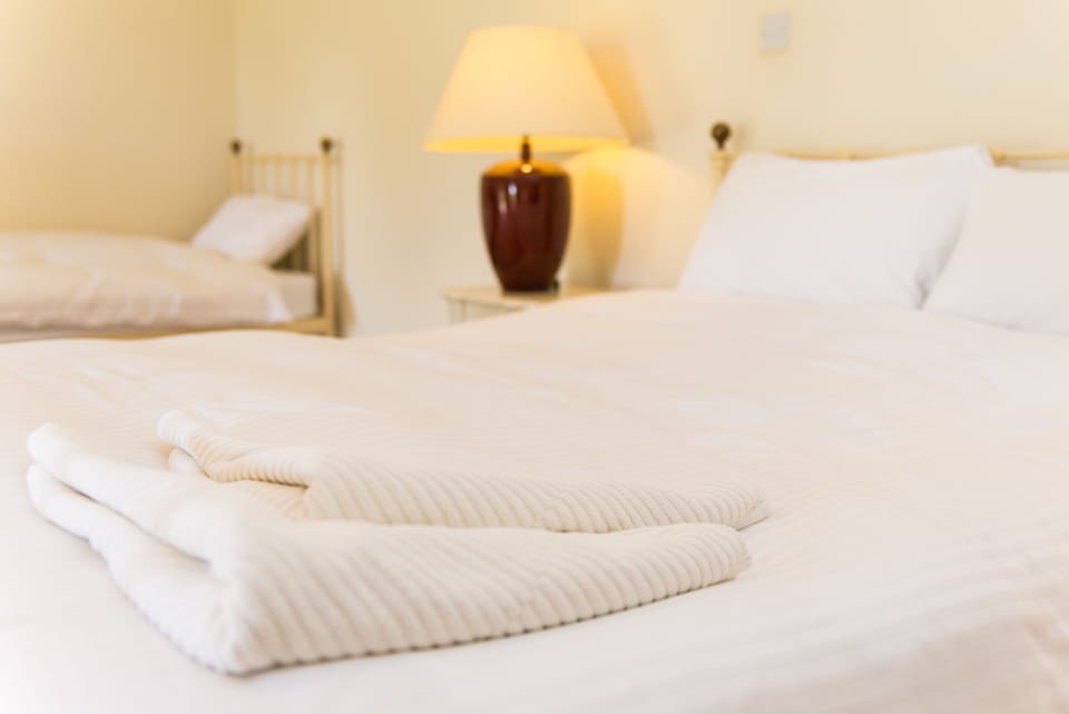 Comfortable beds dressed in Egyptian cotton. Towels provided.