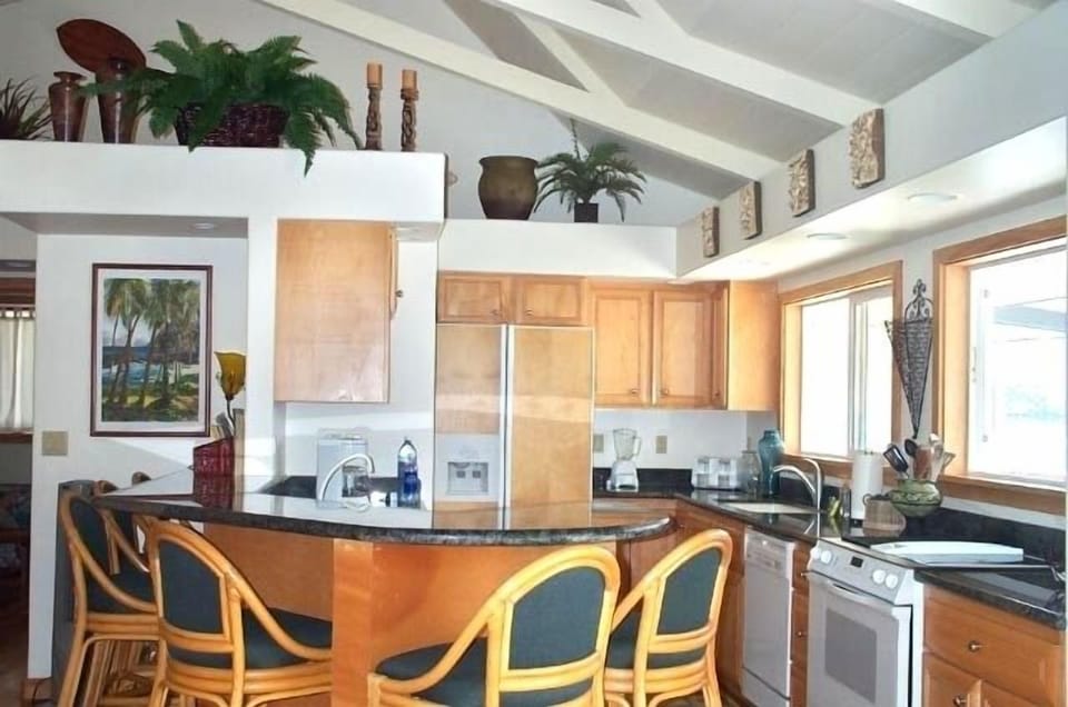 The open living & kitchen area is perfect for family and friends!