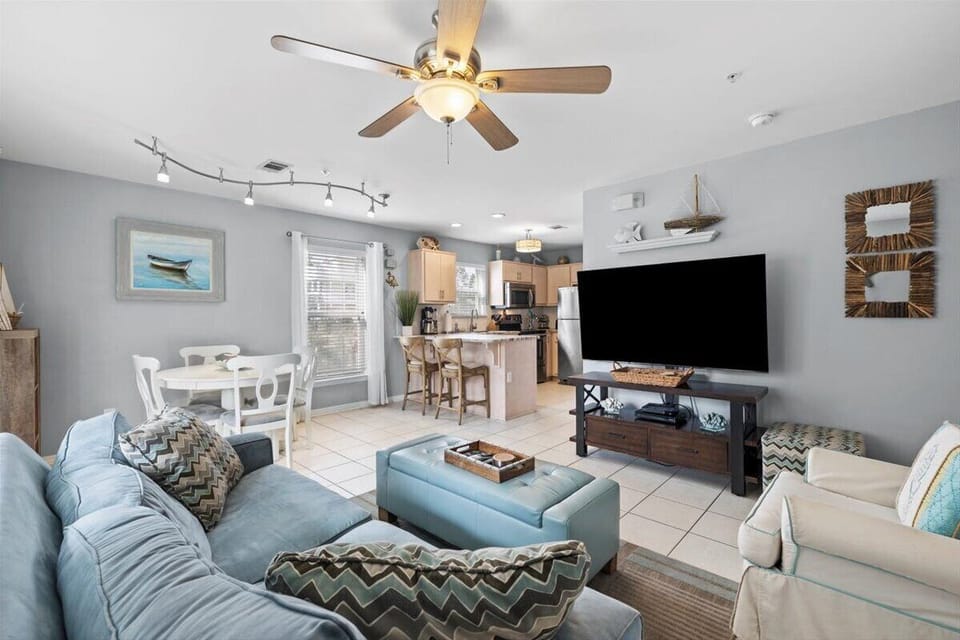 Open floor plan with a 65 inch flat screen for movie night or football games.