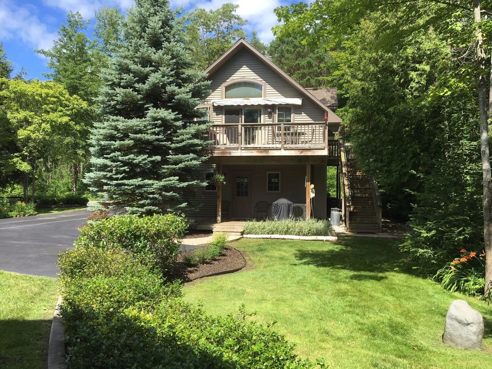 Front/lakeside of carriage house. 
