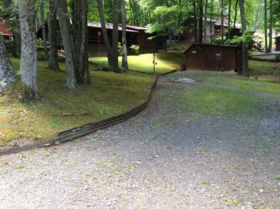 Extra driveway at lower side of property. 