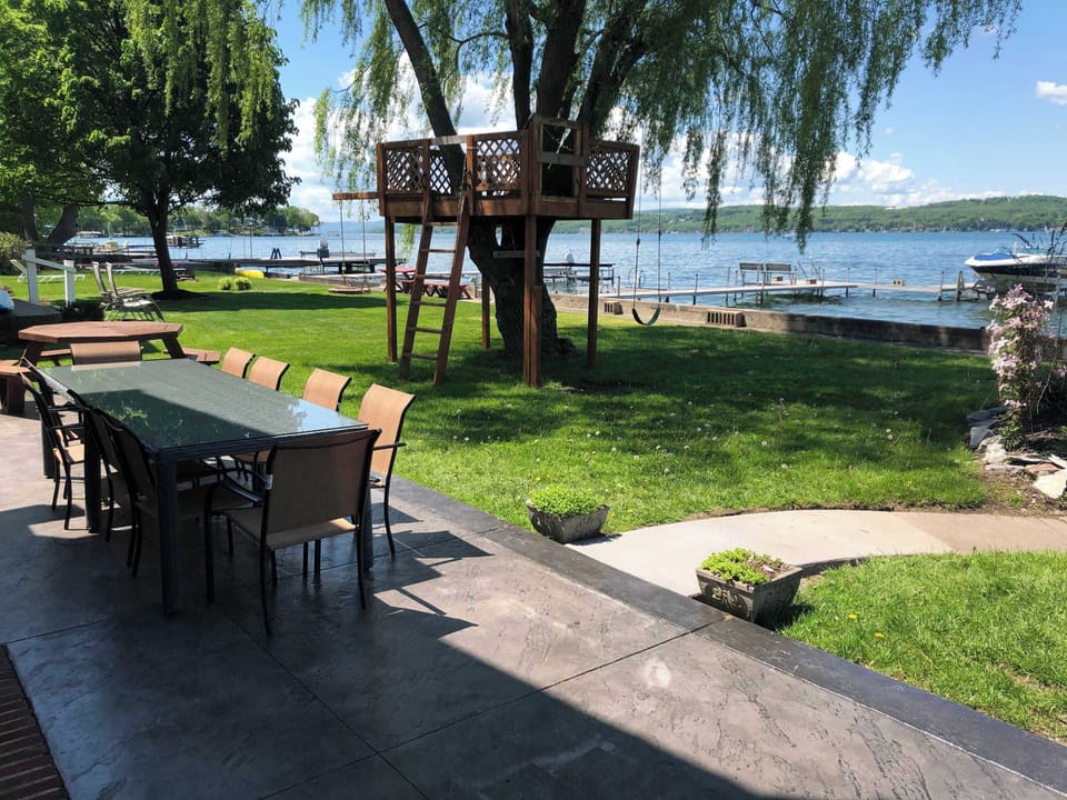 Outdoor dining tables and treehouse