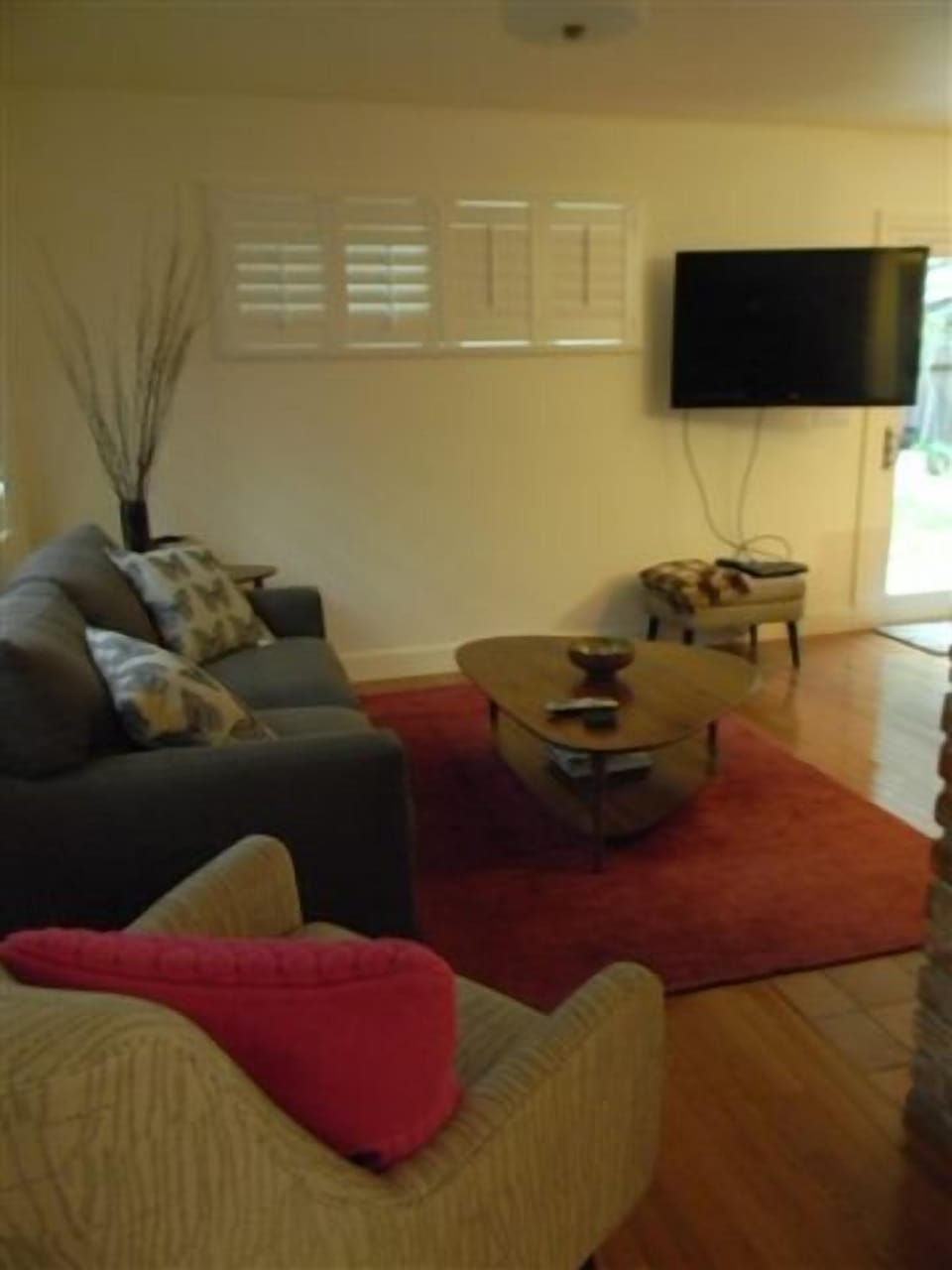 Living Room With Couch Bed, Flatscreen and Fireplace (out of view)