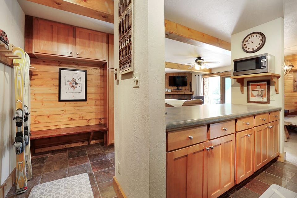 Entryway with storage for coats & skis.  Or use ski locker outside front door