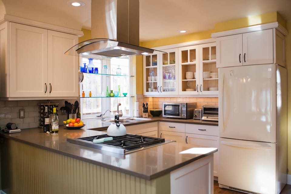 Well appointed Chef's Kitchen, open view toward Living Room