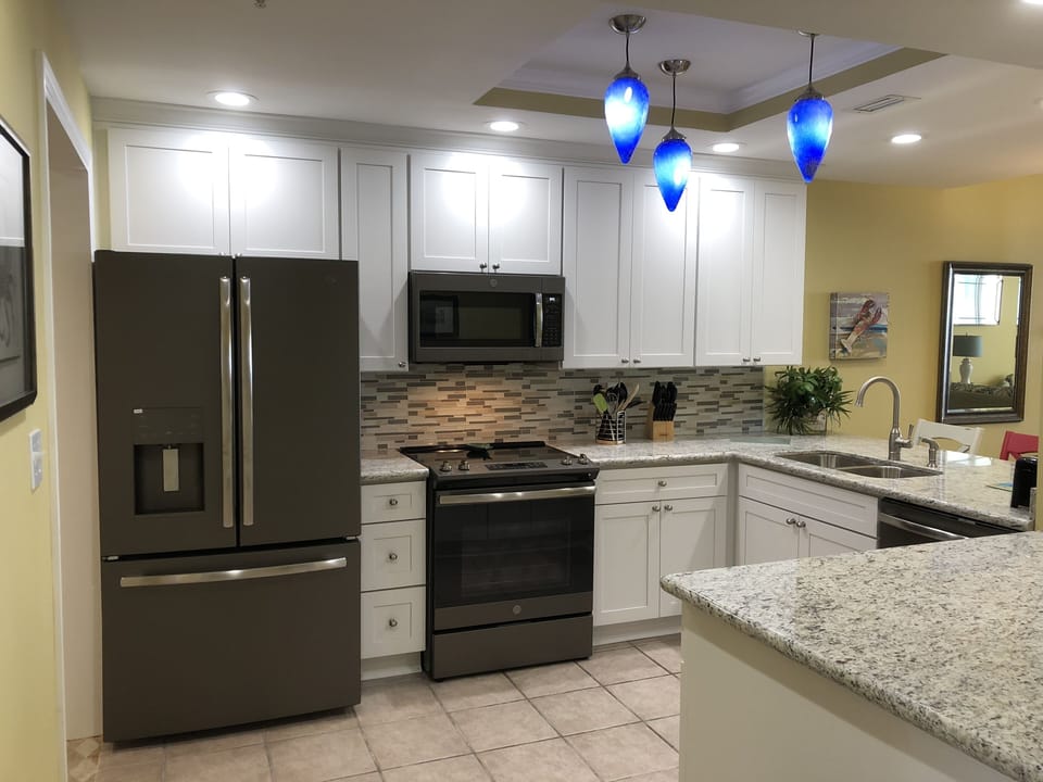 Spacious kitchen that flows from one half of the condo to the other.  