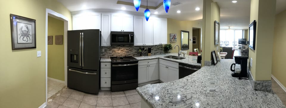 Beautiful kitchen with all new wood cabinets, slate appliances & granite tops.