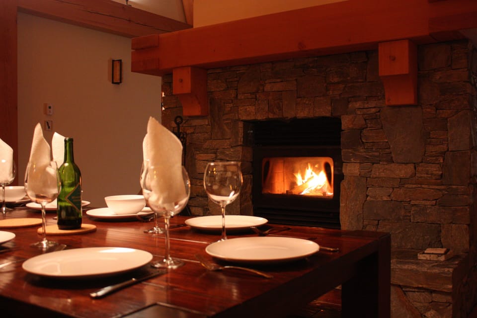Enjoying dinner and relaxing by the  two sided wood burning fire.