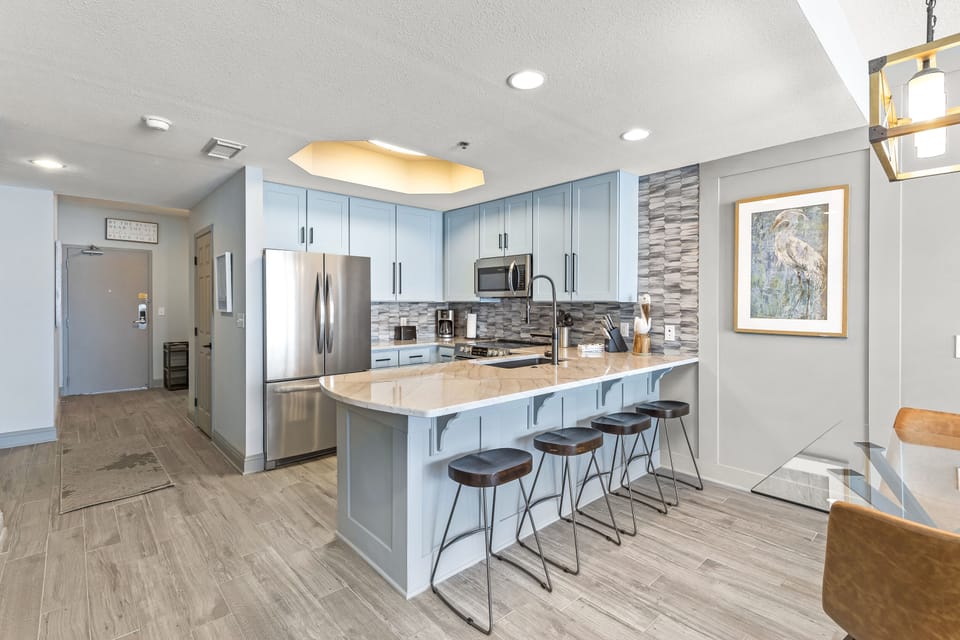 Dining table with seating for four, quartz bar top seating for four
