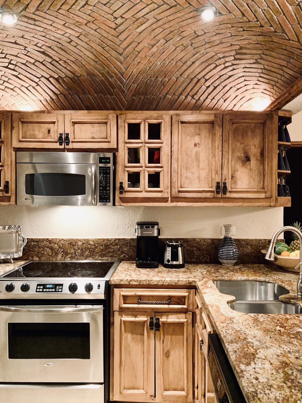 Kitchen with chef essentials and stainless appliances. 
