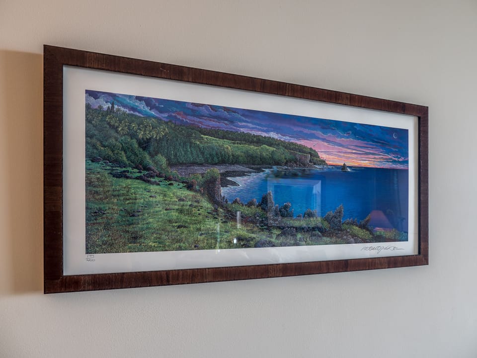 Local artist Robert Lynn Nelson, this is of Hana black sand beach at sunset