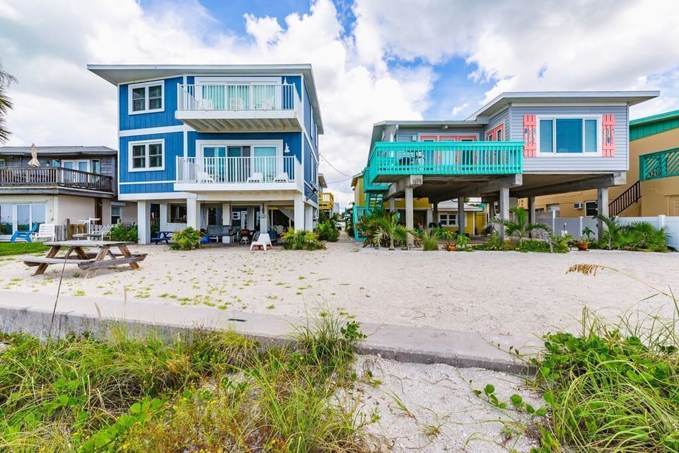 We are located on the second row of houses the yellow house