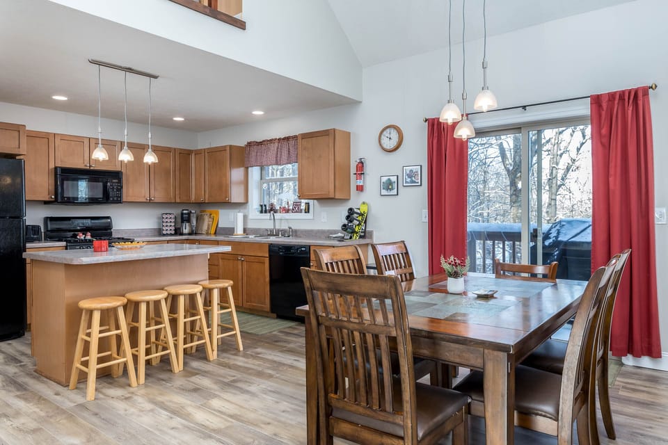 Dining Room with Kitchen in the background