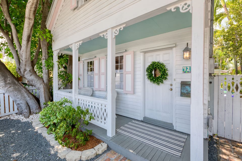 Gated yard with private front porch seating