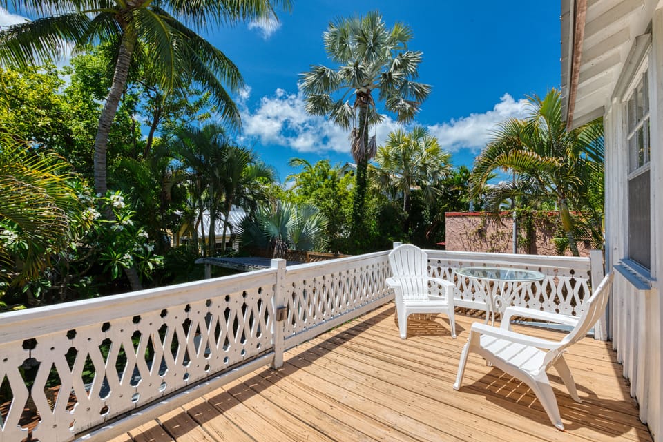 Master room's rear deck overlooking yard