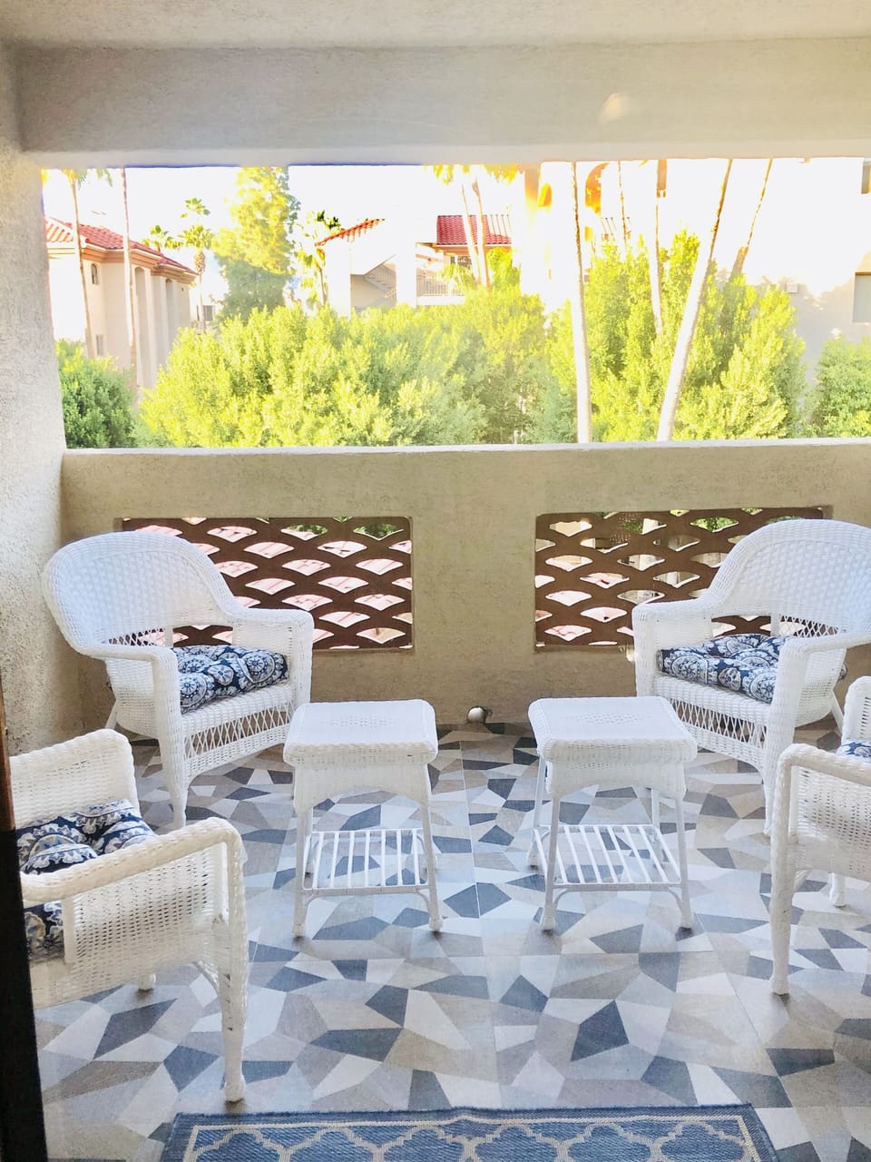 Large covered patio with gorgeous & scenic views. Tropical palms & Phoenix Mtns