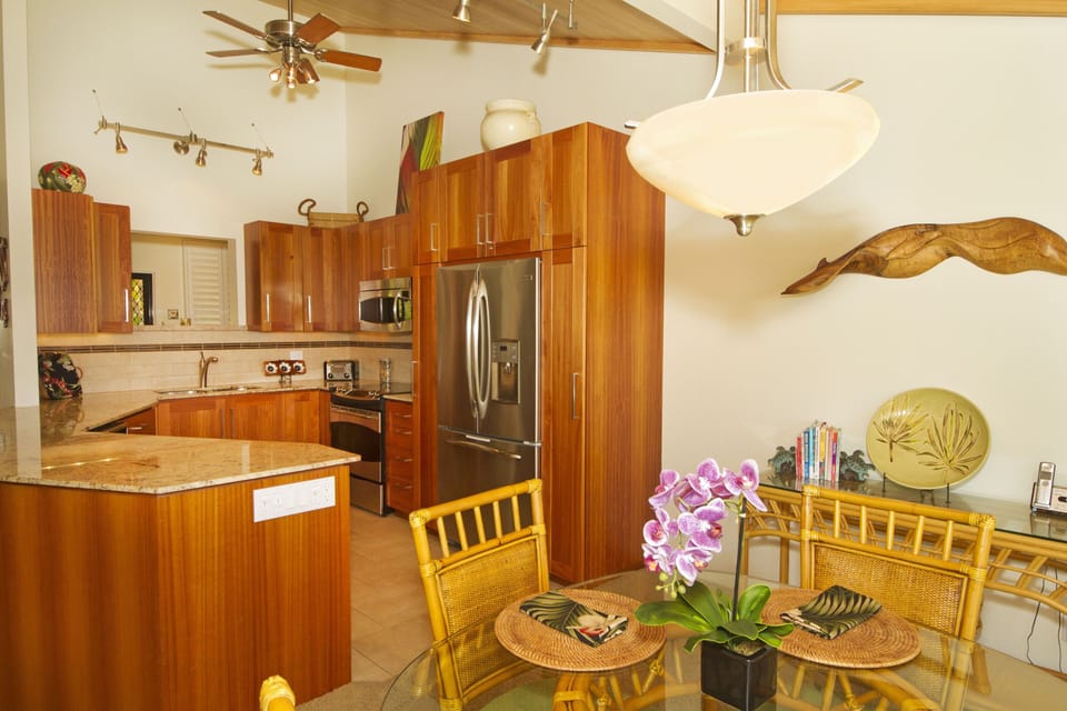 The cabinets are Lyptus wood, an environmentally friendly alternative.