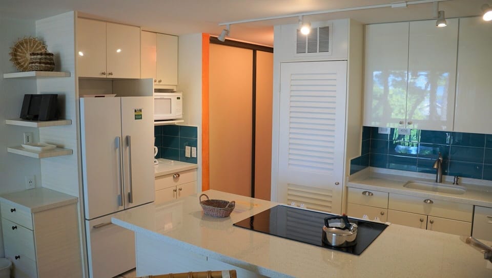 Updated kitchen with large appliance and coffee bar area