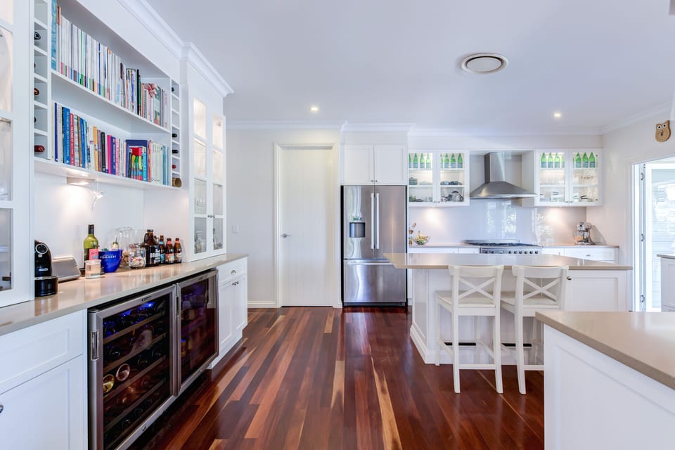 Bar fridges and island bench in the kitchen - perfect for entertaining