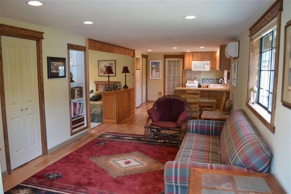 LR, DR, Kitchen with BR area off to left.  Bathroom at far end through door.