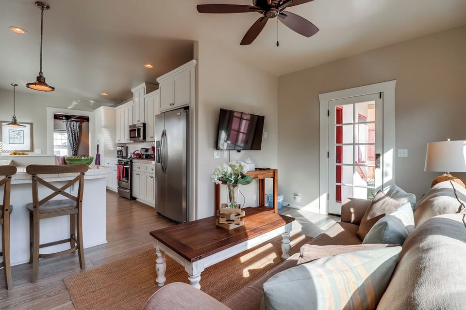 Back living room attached to kitchen.