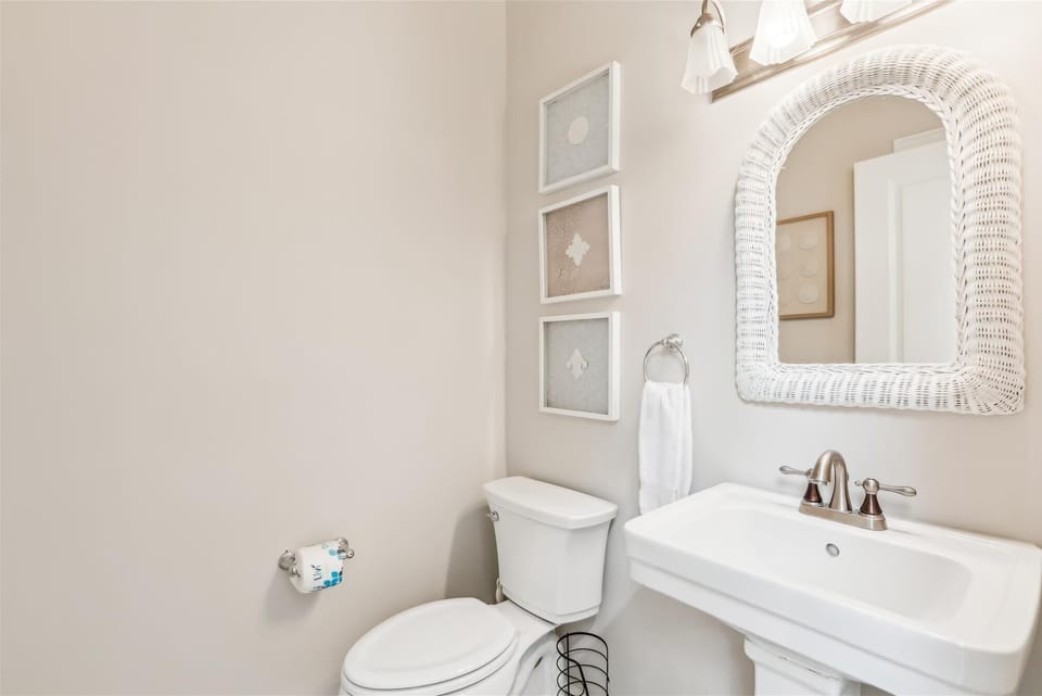 Half Bath Located Just Inside Front Door at 18 Wagon Road