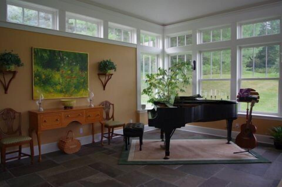 Grand piano in sunroom