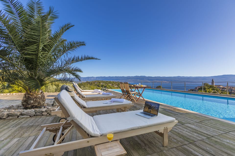 VILLA VRBNIK sundeck by the infinity pool with amazing view and garden furniture