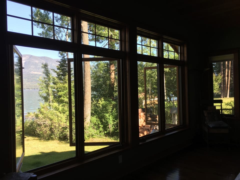SE corner view from master bedroom. (Full lake view, bath great room not shown)