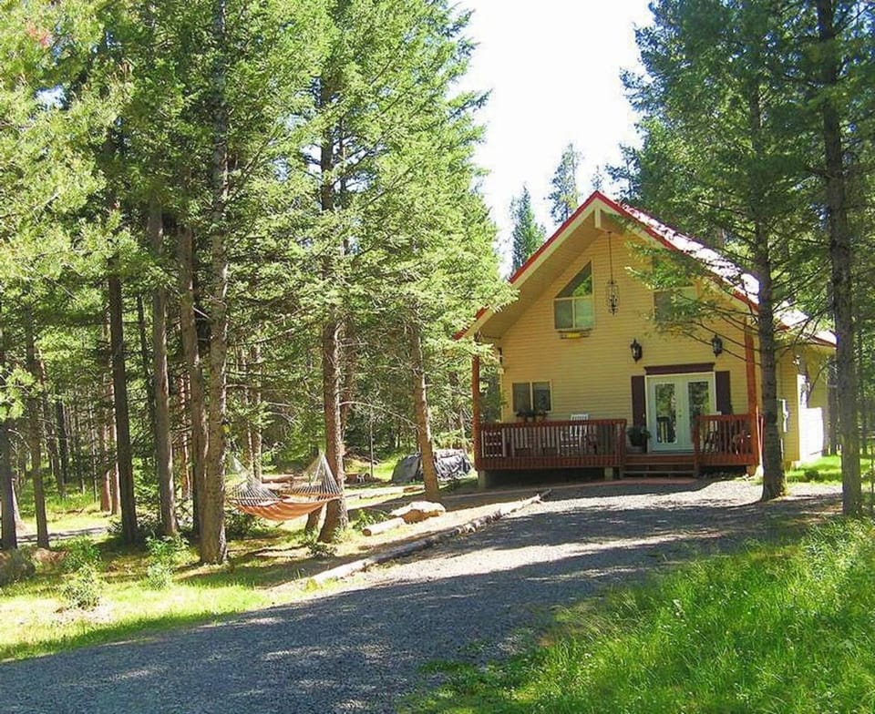 From the front porch, you can hear the birds singing and the wind rushing through the fragrant pines.