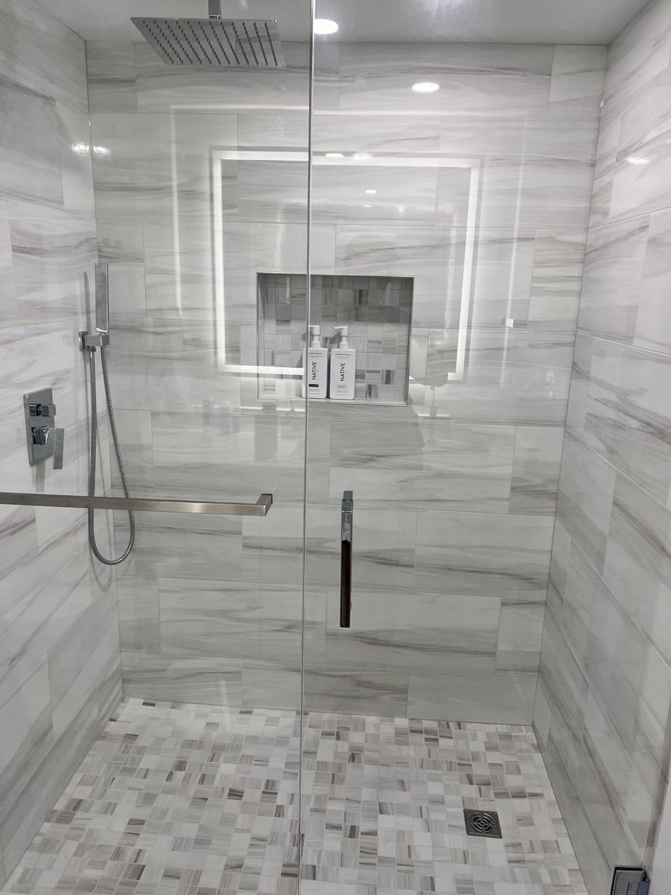 Glass Enclosed Walk-In Shower in both bathrooms with rain head
