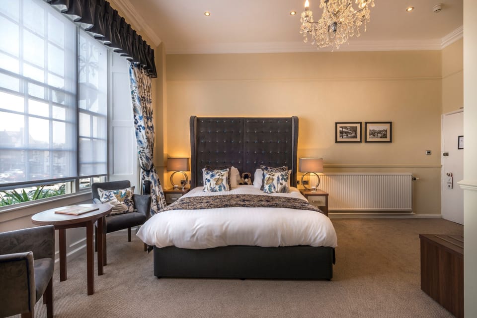 Deluxe Double Room | Desk, blackout drapes, iron/ironing board, free WiFi