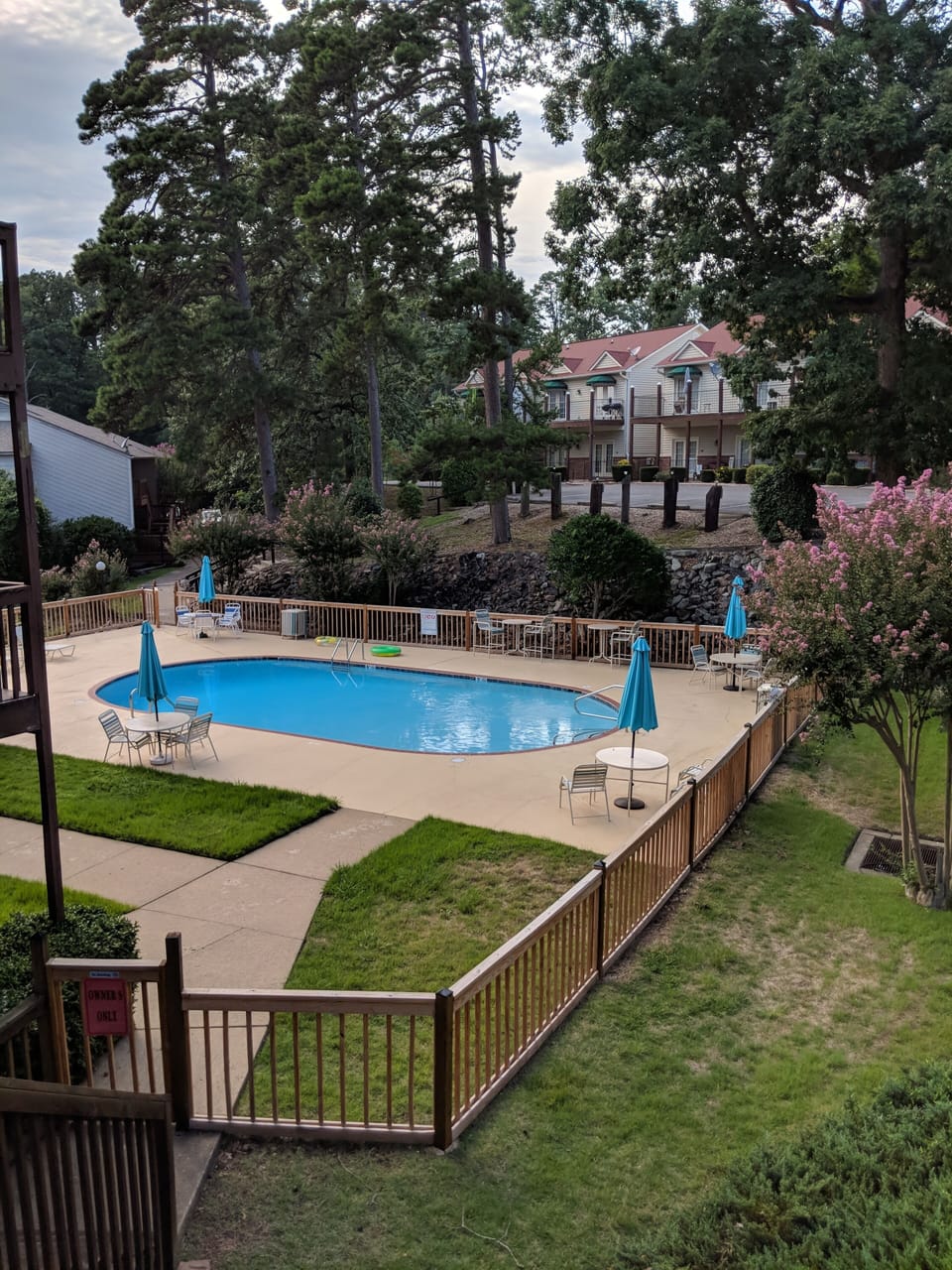 Pool area looking back to condo. Top left building, top right unit. 