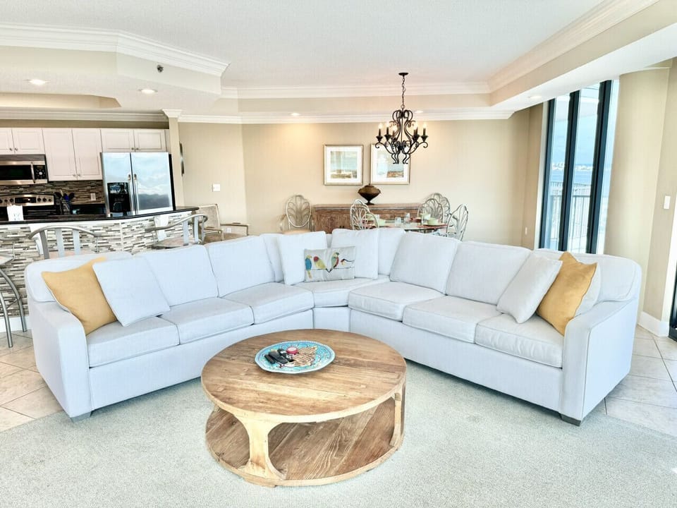 Extra large couch provides plenty of seating space around the TV.