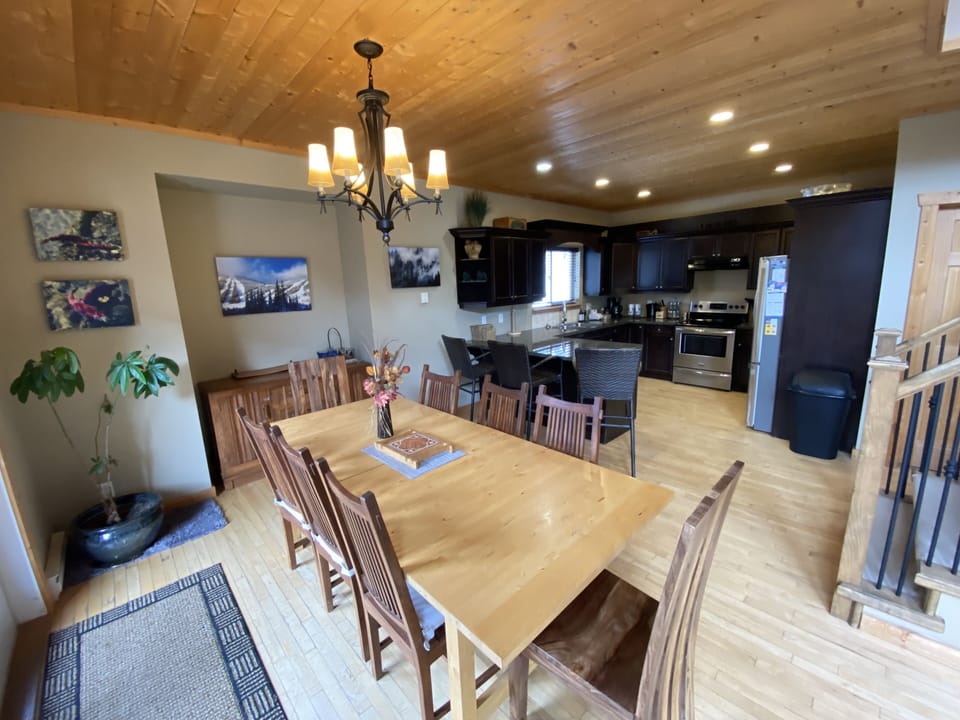 Dining room for 10+ (we have 4 additional folding chairs, + bar stools & bench)
