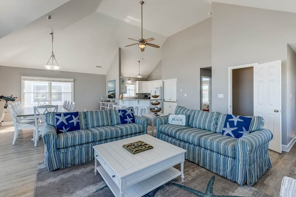 Top-Level Living Room with Deck Access