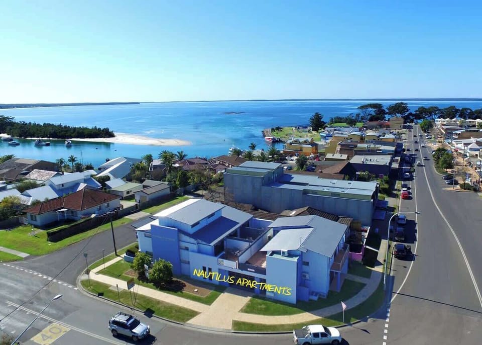 Aerial view of the Nautilus Jervis Bay holiday rentals complex, located on the main street of Huskisson.