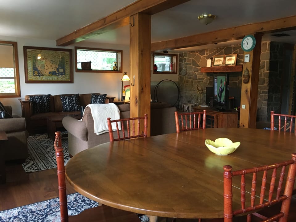 Open-concept living room/kitchen where families can relax & share meals together