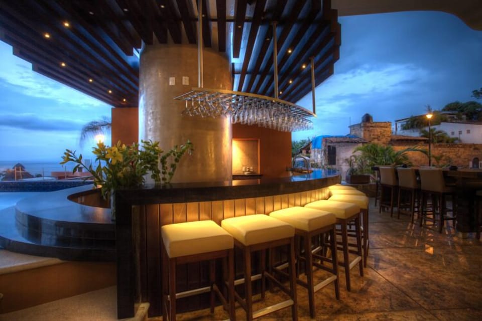 Make new friends at Signature's  social bar with your favorite cocktail & snack.