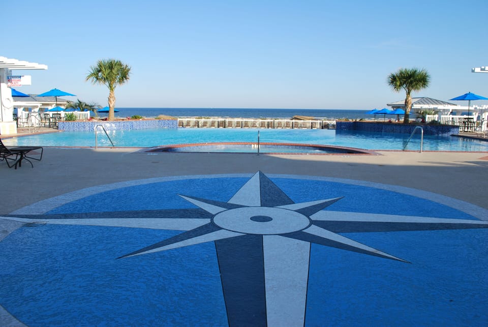 Walking onto the pool deck at the beach club.