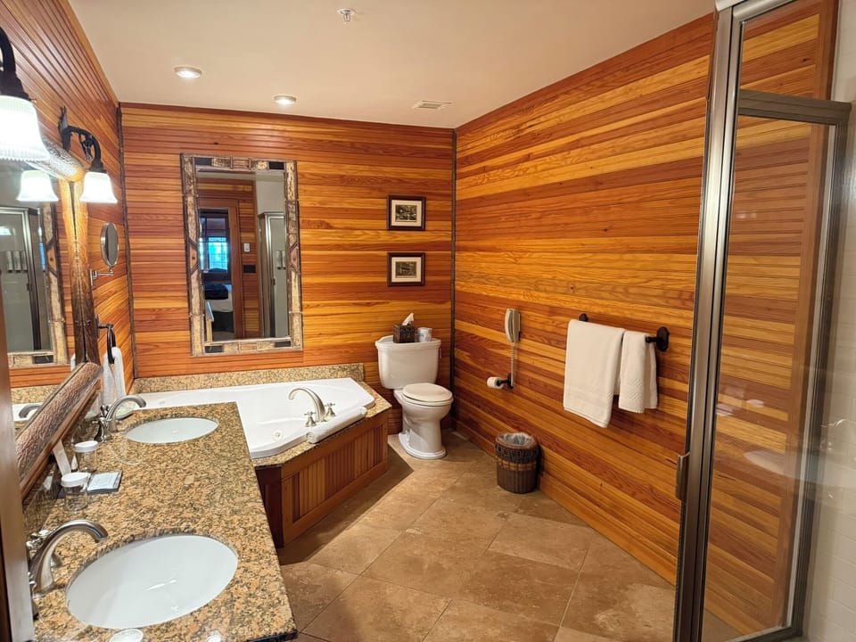 Master bathroom with soaking tub and large standing shower.