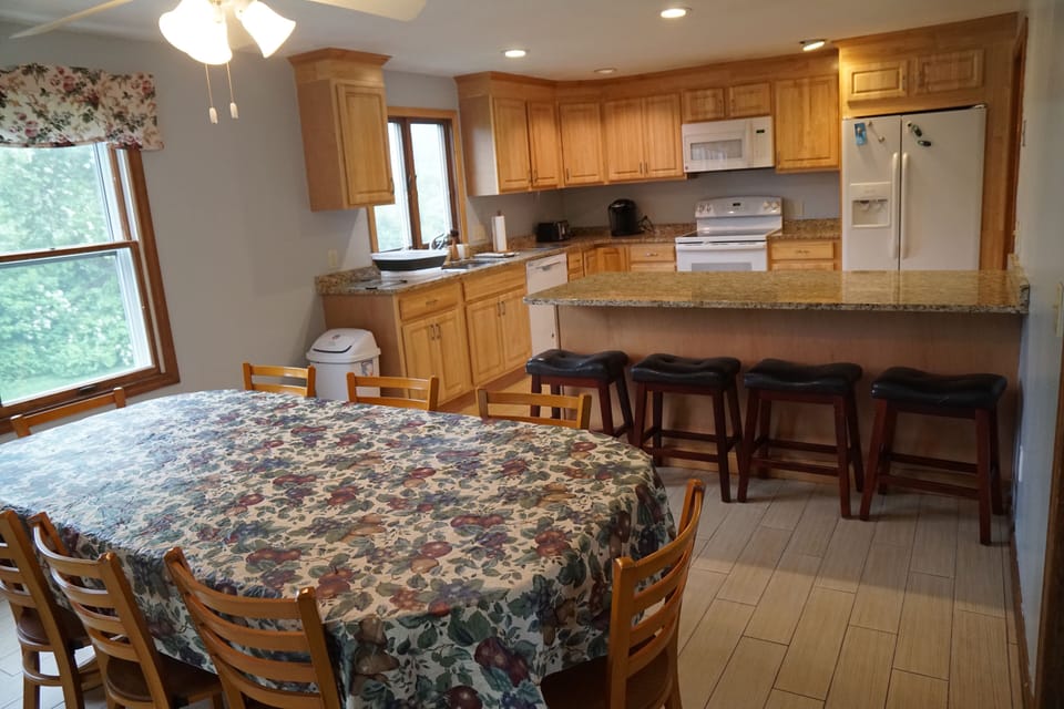 Kitchen and dining room  coming in from the deck
