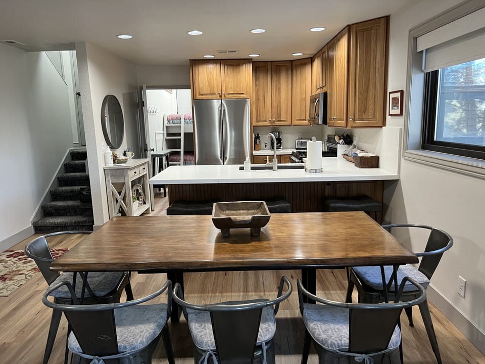 Dining Table seats 8
Kitchen Bar seats 3