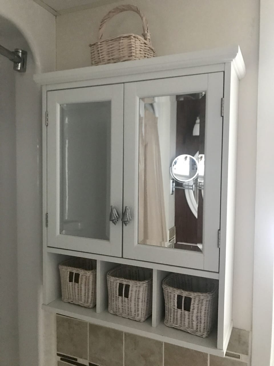 Master bath including magnifying makeup mirror.