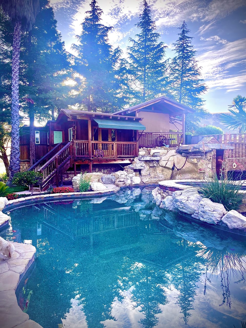 Cabin overlooking swimming pool and patio