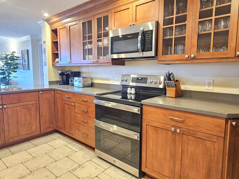 Kitchen with Stainless Steel Appliances at 1848 Beachside Tennis