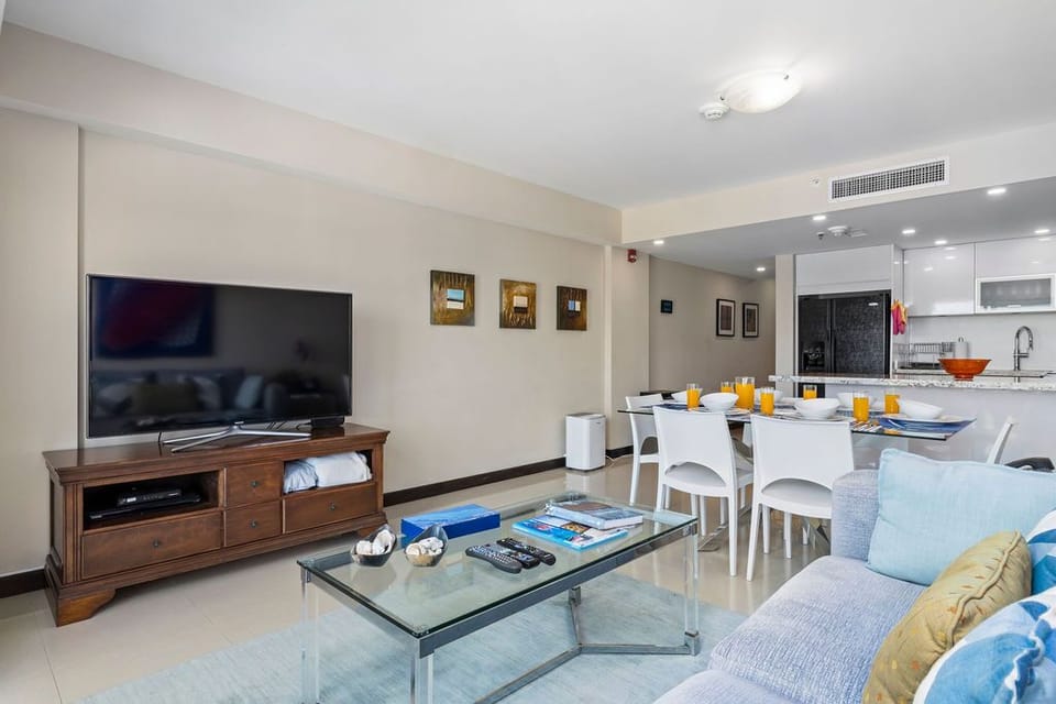 Settle in with a good show while morning sunshine fills your bright, open space—living, dining, and kitchen flow together for easy relaxation and togetherness.