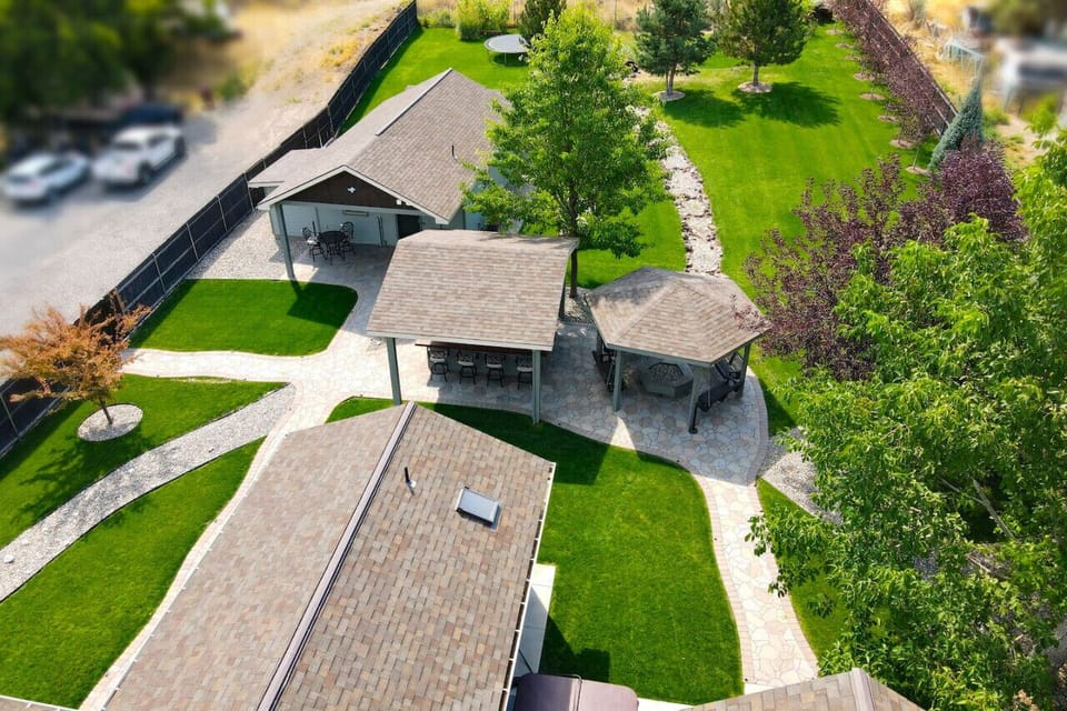 Back yard, outdoor entertainment area, and Claim Jumper`s Cottage (separate rental)
