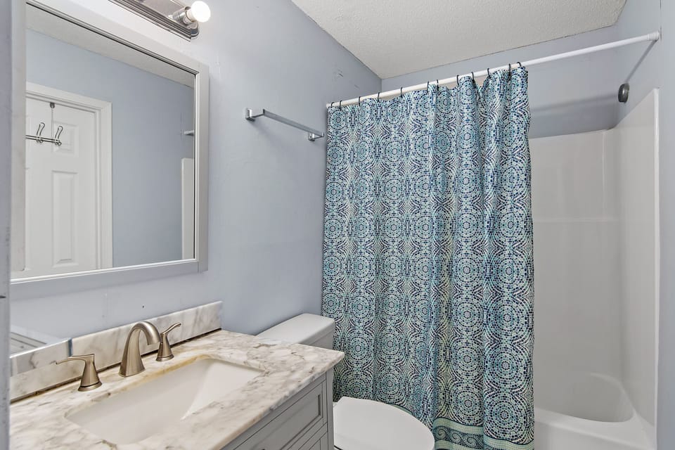 Full bath with shower/tub combo.